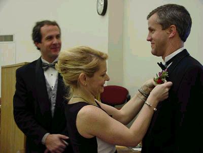 Dianne pins Kirk's Corsage